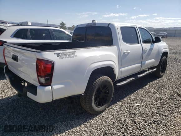2021 Toyota Tacoma SR z VIN 5TFCZ5AN7MX267045, wystawiony jako Copart lot #65592105 z przebiegiem 40 992 mil mil oraz Szkoda całkowita • Salvage title. Historia ofert i sprzedaży dostępna na DreamBid. Obrazek 3.