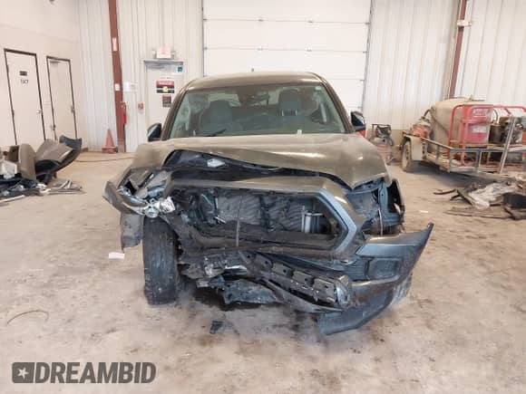 2023 Toyota Tacoma SR with VIN 3TMCZ5AN0PM540529, listed as a IAAI auction lot 43088233 with 75,792 mi miles and . Bid and sale history available at DreamBid. Image 6.
