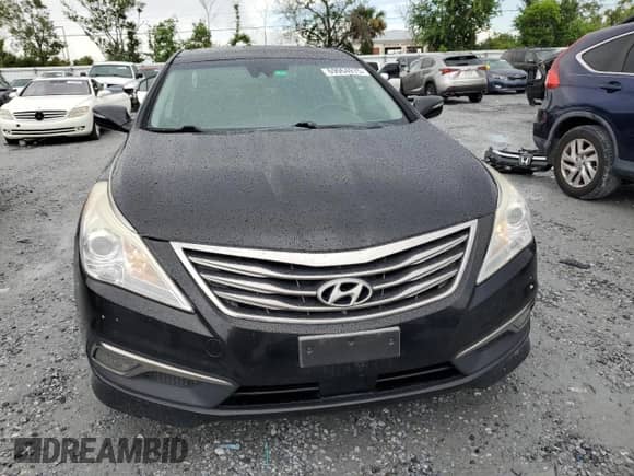 2017 Hyundai Azera Limited z VIN KMHFH4JGXHA590182, wystawiony jako Copart lot #69964975 z przebiegiem 135 911 mil mil oraz Szkoda całkowita • Salvage title. Historia ofert i sprzedaży dostępna na DreamBid. Obrazek 5.