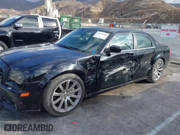 2007 Chrysler 300 C SRT-8 with VIN 2C3LA73W37H658358, listed as a IAAI auction lot 43439006 with 175,088 mi miles and . Bid and sale history available at DreamBid. Image 14.