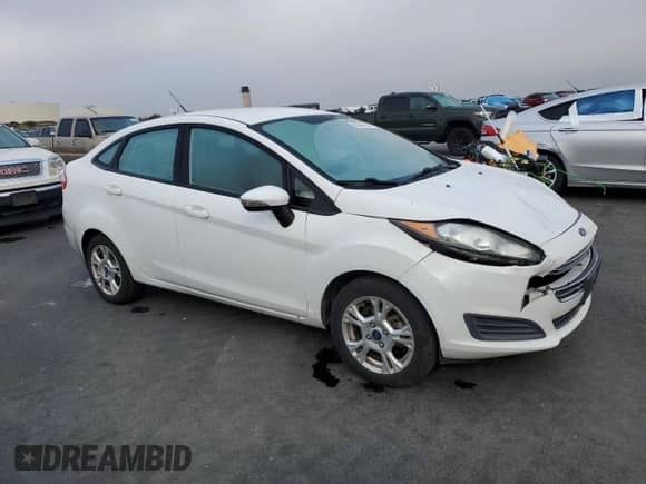 2015 Ford Fiesta SE z VIN 3FADP4BJ6FM136249, wystawiony jako Copart lot #90844195 z przebiegiem 133 405 mil mil oraz Szkoda całkowita • Salvage title. Historia ofert i sprzedaży dostępna na DreamBid. Obrazek 4.