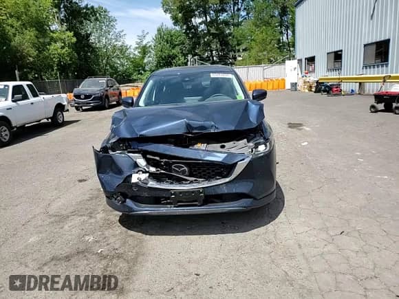 2024 Mazda CX-5 S Preferred z VIN JM3KFBCL8R0491558, wystawiony jako Copart lot #65481855 z przebiegiem 18 305 mil mil oraz Szkoda całkowita • Salvage title. Historia ofert i sprzedaży dostępna na DreamBid. Obrazek 14.