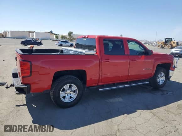 2015 Chevrolet Silverado 1500 LT with VIN 3GCPCREC9FG136726, listed as a Copart auction lot 71115305 with 37,077 mi miles and Salvage title. Bid and sale history available at DreamBid. Image 3.