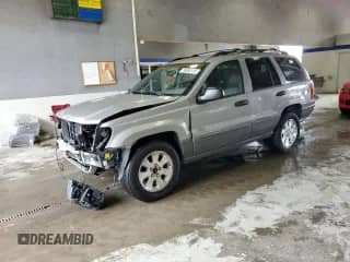 2001 Jeep Grand Cherokee Laredo with VIN 1J4GW48N71C515446, listed as a Copart auction lot 56646155 with 192,413 mi miles and Salvage title. Bid and sale history available at DreamBid. Image 1.