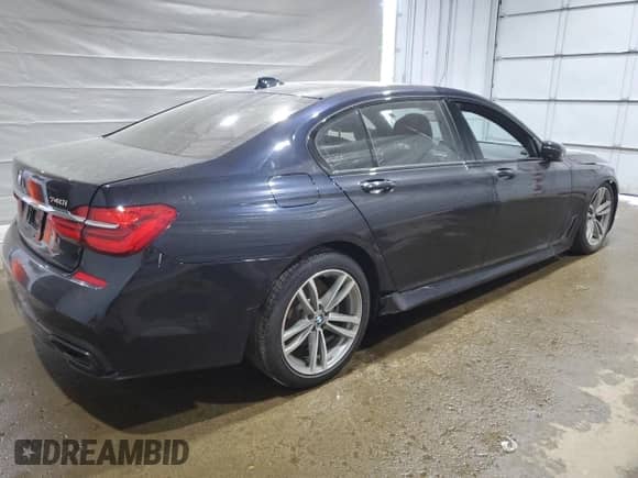 2019 BMW 7 Series 740i xDrive with VIN WBA7E4C58KGV70026, listed as a Copart auction lot 59465615 with Not provided miles and Salvage title. Bid and sale history available at DreamBid. Image 3.