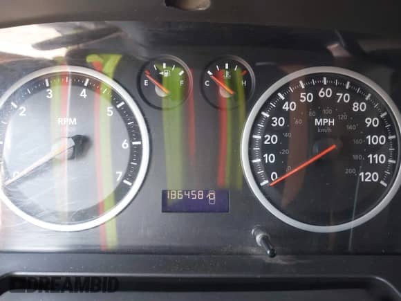 2012 Ram 1500 z VIN 3C6JD7DPXCG259725, wystawiony jako IAAI lot #42409076 z przebiegiem 186 458 mil mil oraz . Historia ofert i sprzedaży dostępna na DreamBid. Obrazek 7.