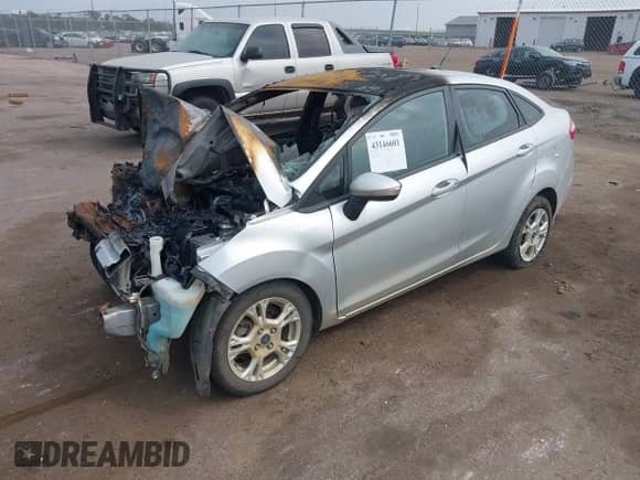 2014 Ford Fiesta SE with VIN 3FADP4BJ5EM228368, listed as a IAAI auction lot 43146601 with Not provided miles and . Bid and sale history available at DreamBid. Image 16.