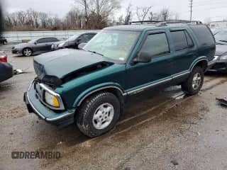 1997 Chevrolet Blazer LS with VIN 1GNDT13W1V2254432, listed as a Copart auction lot 74691234 with 136,331 mi miles and Salvage title. Bid and sale history available at DreamBid. Image 1.