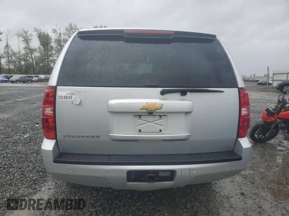 2014 Chevrolet Suburban LT with VIN 1GNSKJE76ER110642, listed as a Copart auction lot 69009075 with 201,191 mi miles and Salvage title. Bid and sale history available at DreamBid. Image 6.