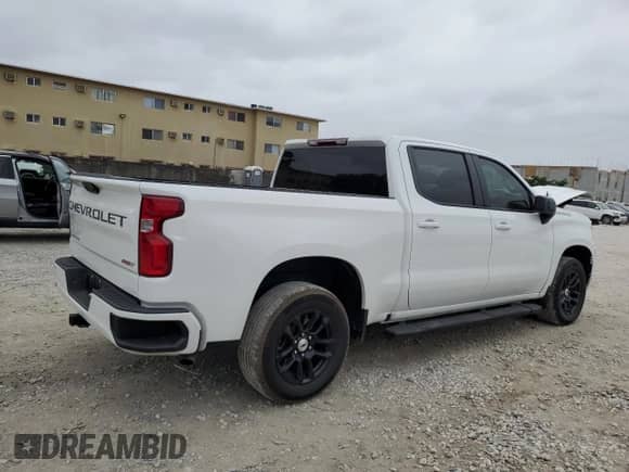 2023 Chevrolet Silverado 1500 z VIN 1GCPADE86PZ321242, wystawiony jako Copart lot #77026824 z przebiegiem 7 400 mil mil oraz Szkoda całkowita • Salvage title. Historia ofert i sprzedaży dostępna na DreamBid. Obrazek 3.