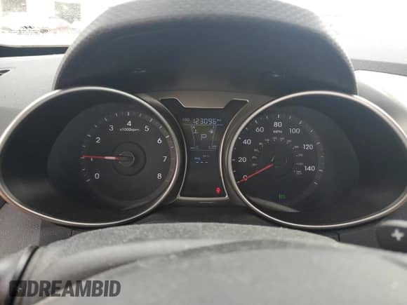 2012 Hyundai Veloster w/Red Int z VIN KMHTC6AD0CU053458, wystawiony jako Copart lot #60790585 z przebiegiem 123 096 mil mil oraz Czysty tytuł • Clean title. Historia ofert i sprzedaży dostępna na DreamBid. Obrazek 9.