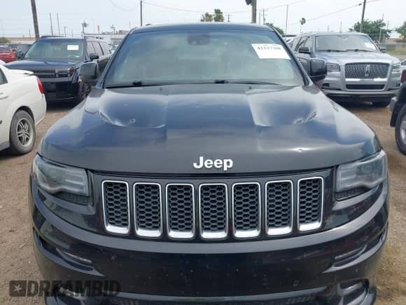 2014 Jeep Grand Cherokee SRT-8 с VIN 1C4RJFDJ7EC498388, выставлен на аукционе IAAI как лот 42237388 с пробегом 192 275 миль миль и . История ставок и продаж доступна на DreamBid. Изображение 12.