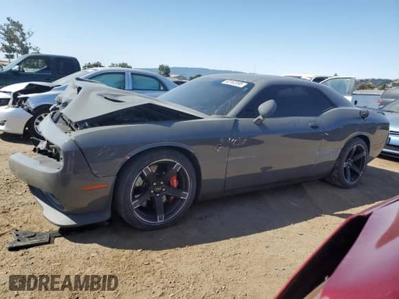 2018 Dodge Challenger SRT Hellcat Widebody with VIN 2C3CDZC9XJH218674, listed as a Copart auction lot 63162095 with 16,790 mi miles and Salvage title. Bid and sale history available at DreamBid. Image 1.