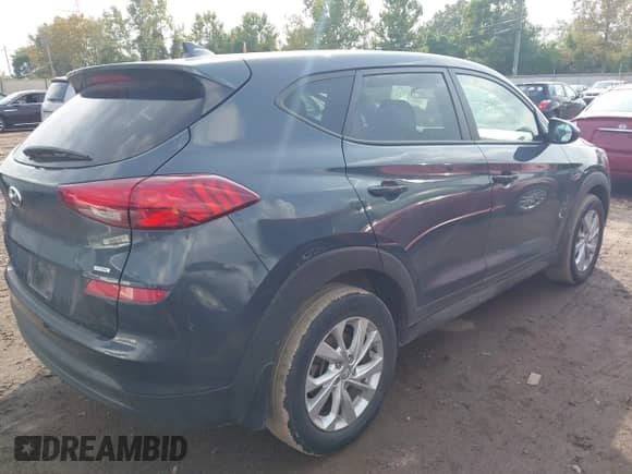 2020 Hyundai Tucson SE with VIN KM8J2CA43LU226799, listed as a IAAI auction lot 43236121 with 53,650 mi miles and . Bid and sale history available at DreamBid. Image 4.