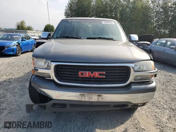 2002 GMC Sierra 1500 SLE with VIN 2GTEK19T921184011, listed as a Copart auction lot 70599255 with 205,498 mi miles and Salvage title. Bid and sale history available at DreamBid. Image 5.