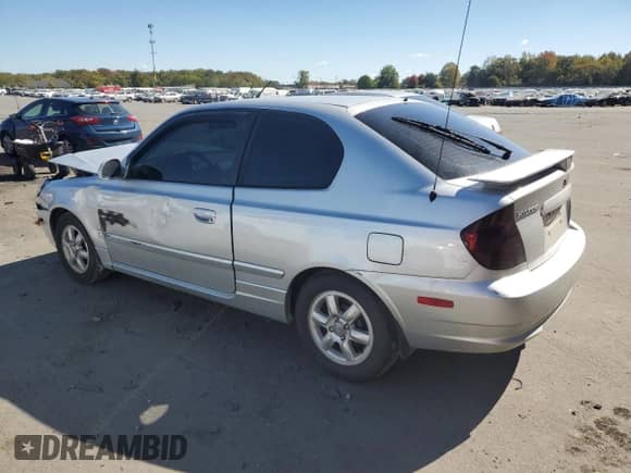 2005 Hyundai Accent GLS с VIN KMHCG35C05U331928, выставлен на аукционе Copart как лот 74672614 с пробегом 41 542 миль миль и Списание • Salvage title. История ставок и продаж доступна на DreamBid. Изображение 2.