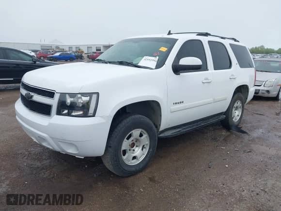 2007 Chevrolet Tahoe LTZ z VIN 1GNFC13017R275263, wystawiony jako IAAI lot #42151951 z przebiegiem 210 574 mil mil oraz . Historia ofert i sprzedaży dostępna na DreamBid. Obrazek 2.