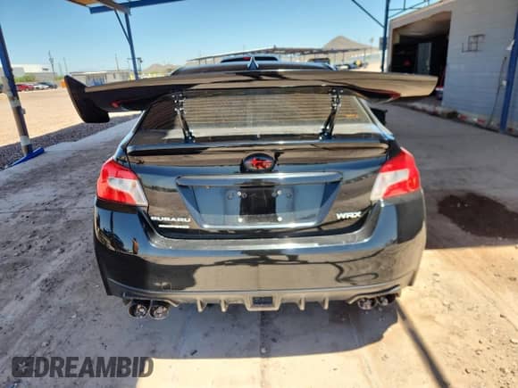 2017 Subaru WRX Premium z VIN JF1VA1E69H8840299, wystawiony jako Copart lot #59629635 z przebiegiem 78 461 mil mil oraz Szkoda całkowita • Salvage title. Historia ofert i sprzedaży dostępna na DreamBid. Obrazek 6.
