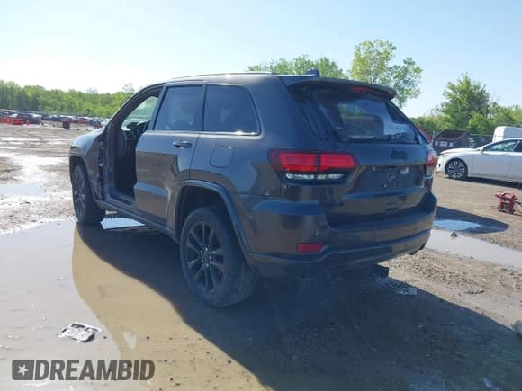 2021 Jeep Grand Cherokee Laredo X with VIN 1C4RJFAG7MC889483, listed as a IAAI auction lot 42286127 with 48,454 mi miles and . Bid and sale history available at DreamBid. Image 3.