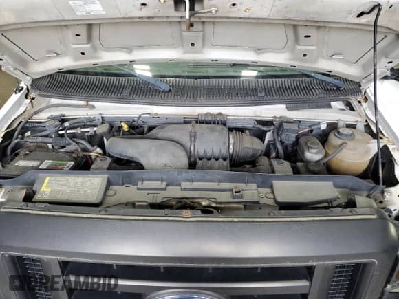 2008 Ford Econoline Cargo Commercial с VIN 1FTNE14W68DA36212, выставлен на аукционе Copart как лот 65127735 с пробегом 156 970 миль миль и Списание • Salvage title. История ставок и продаж доступна на DreamBid. Изображение 12.