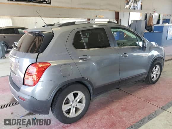 2015 Chevrolet Trax LT z VIN KL7CJRSBXFB148700, wystawiony jako Copart lot #80224105 z przebiegiem 118 020 mil mil oraz Szkoda całkowita • Salvage title. Historia ofert i sprzedaży dostępna na DreamBid. Obrazek 3.