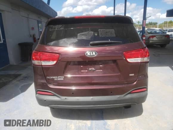 2018 Kia Sorento L z VIN 5XYPG4A37JG406346, wystawiony jako Copart lot #85595685 z przebiegiem 96 487 mil mil oraz Czysty tytuł • Clean title. Historia ofert i sprzedaży dostępna na DreamBid. Obrazek 6.