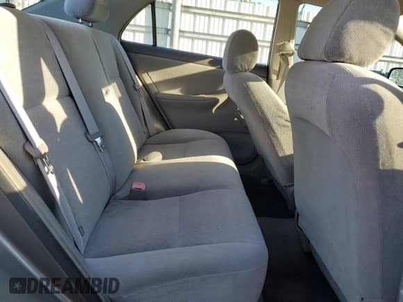 2004 Toyota Corolla CE z VIN 1NXBR32E24Z256577, wystawiony jako Copart lot #86673345 z przebiegiem Nie podano mil oraz Szkoda całkowita • Salvage title. Historia ofert i sprzedaży dostępna na DreamBid. Obrazek 10.