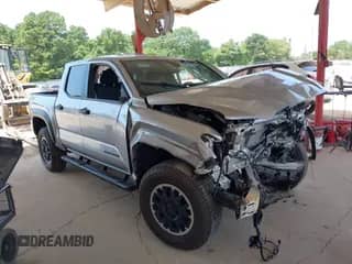 2024 Toyota Tacoma SR5 with VIN 3TYLB5JN4RT023360, listed as a IAAI auction lot 42874391 with 11,377 mi miles and . Bid and sale history available at DreamBid. Image 1.