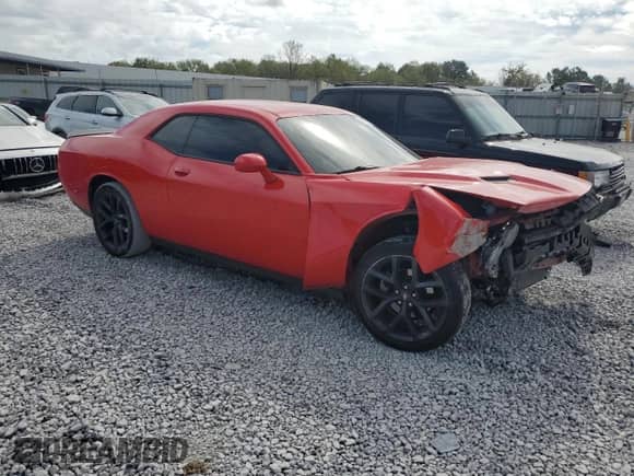 2021 Dodge Challenger SXT with VIN 2C3CDZAG9MH646189, listed as a Copart auction lot 84974085 with 87,424 mi miles and Salvage title. Bid and sale history available at DreamBid. Image 4.
