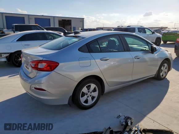 2016 Chevrolet Cruze LS с VIN 1G1BB5SMXG7276020, выставлен на аукционе Copart как лот 85323385 с пробегом 108 234 миль миль и Списание • Salvage title. История ставок и продаж доступна на DreamBid. Изображение 3.