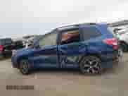 2014 Subaru Forester XT Touring z VIN JF2SJGMC9EH428341, wystawiony jako IAAI lot #41185804 z przebiegiem 111 000 mil mil oraz . Historia ofert i sprzedaży dostępna na DreamBid. Obrazek 14.