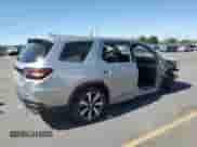 2024 Honda Pilot Touring with VIN 5FNYG1H73RB036382, listed as a Copart auction lot 69703235 with 30,329 mi miles and Salvage title. Bid and sale history available at DreamBid. Image 3.