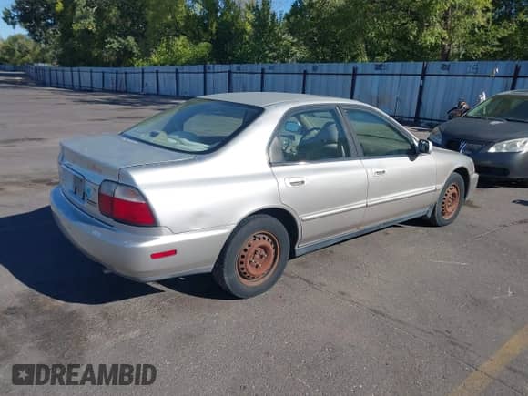 1997 Honda Accord Special Edition with VIN 1HGCD5601VA236102, listed as a IAAI auction lot 43285179 with 249,942 mi miles and . Bid and sale history available at DreamBid. Image 4.