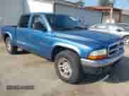2002 Dodge Dakota SLT with VIN 1B7HL48N82S658321, listed as a IAAI auction lot 41506738 with 252,950 mi miles and . Bid and sale history available at DreamBid. Image 1.
