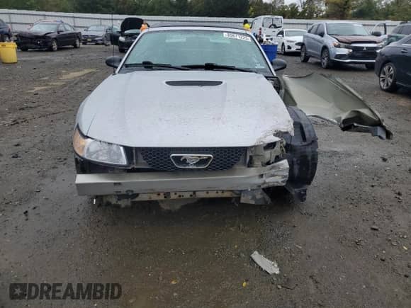 2000 Ford Mustang GT z VIN 1FAFP45XXYF256180, wystawiony jako Copart lot #85671225 z przebiegiem Nie podano mil oraz Szkoda całkowita • Salvage title. Historia ofert i sprzedaży dostępna na DreamBid. Obrazek 5.