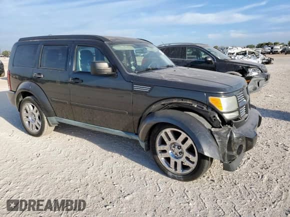 2011 Dodge Nitro Heat with VIN 1D4PT4GK9BW570618, listed as a Copart auction lot 84421505 with 76,339 mi miles and Salvage title. Bid and sale history available at DreamBid. Image 4.