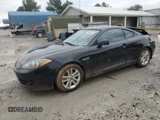 2007 Hyundai Tiburon GS с VIN KMHHM66D17U248440, выставлен на аукционе Copart как лот 86642384 с пробегом 125 156 миль миль и Чистый • Clean title. История ставок и продаж доступна на DreamBid. Изображение 1.