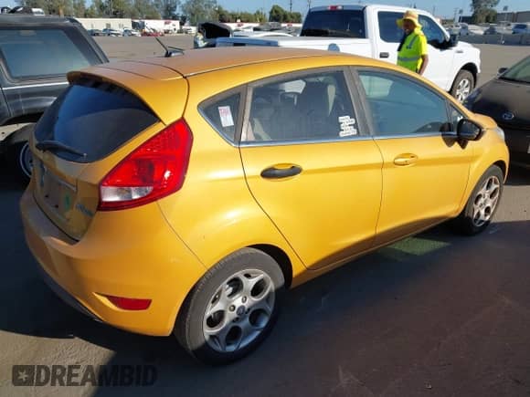2011 Ford Fiesta SES with VIN 3FADP4FJ8BM127606, listed as a IAAI auction lot 43409509 with 167,457 mi miles and . Bid and sale history available at DreamBid. Image 4.