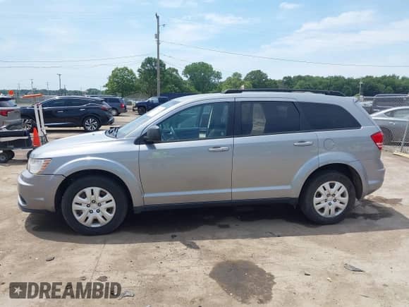 2020 Dodge Journey SE Value with VIN 3C4PDCABXLT237199, listed as a IAAI auction lot 42711626 with 145,090 mi miles and . Bid and sale history available at DreamBid. Image 14.