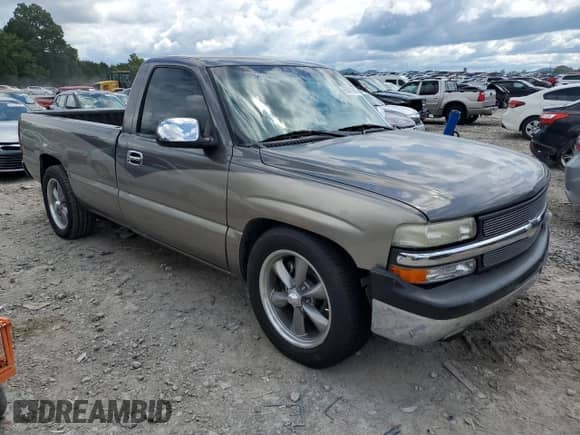 1999 Chevrolet Silverado 1500 with VIN 1GCEC14V0XE137610, listed as a Copart auction lot 65806015 with 103,303 mi miles and Salvage title. Bid and sale history available at DreamBid. Image 4.