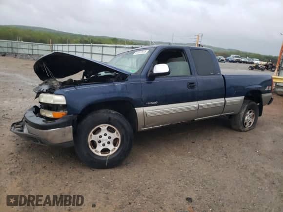 2000 Chevrolet Silverado 1500 LS with VIN 2GCEK19VXY1236322, listed as a Copart auction lot 51577915 with 243,287 mi miles and Salvage title. Bid and sale history available at DreamBid. Image 1.