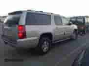 2007 Chevrolet Suburban LT z VIN 1GNFK16387J309545, wystawiony jako IAAI lot #43408763 z przebiegiem 221 834 mil mil oraz . Historia ofert i sprzedaży dostępna na DreamBid. Obrazek 4.