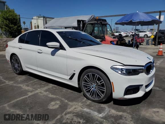 2020 BMW 5 Series 530e with VIN WBAJA9C04LCD22175, listed as a Copart auction lot 56173635 with 64,371 mi miles and Salvage title. Bid and sale history available at DreamBid. Image 4.