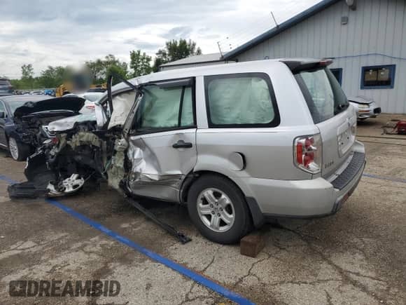 2007 Honda Pilot LX с VIN 5FNYF28167B006424, выставлен на аукционе Copart как лот 66957875 с пробегом Не указан миль и Списание • Salvage title. История ставок и продаж доступна на DreamBid. Изображение 2.