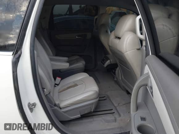 2014 Chevrolet Traverse LT z VIN 1GNKRHKD0EJ293923, wystawiony jako IAAI lot #42900872 z przebiegiem 179 018 mil mil oraz . Historia ofert i sprzedaży dostępna na DreamBid. Obrazek 8.