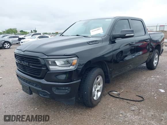 2020 Ram 1500 Big Horn with VIN 1C6RRFFG7LN273861, listed as a IAAI auction lot 42184889 with 75,679 mi miles and . Bid and sale history available at DreamBid. Image 2.