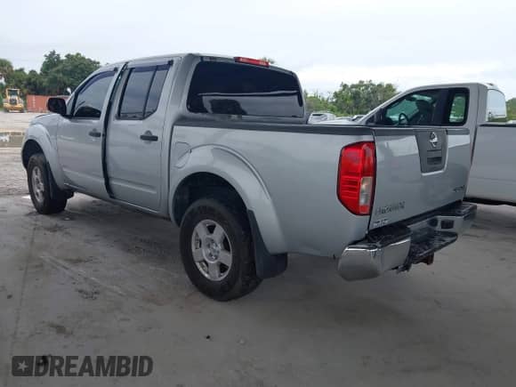 2005 Nissan Frontier Nismo with VIN 1N6AD07W35C446780, listed as a IAAI auction lot 43189679 with 138,461 mi miles and . Bid and sale history available at DreamBid. Image 3.