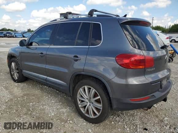 2012 Volkswagen Tiguan S с VIN WVGAV7AX4CW000140, выставлен на аукционе Copart как лот 80901355 с пробегом 133 056 миль миль и Списание • Salvage title. История ставок и продаж доступна на DreamBid. Изображение 2.