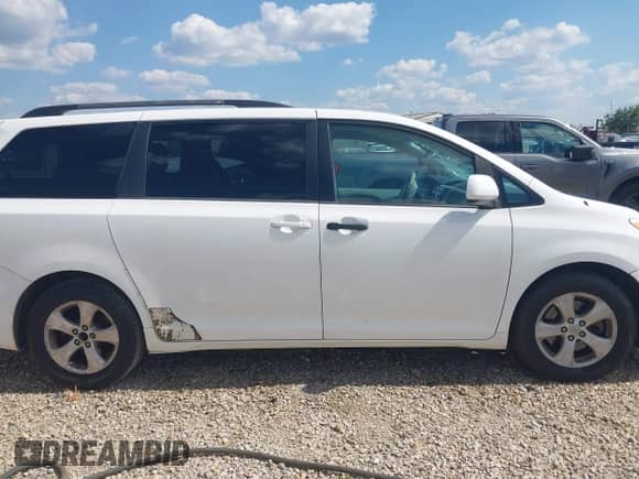 2013 Toyota Sienna LE AAS with VIN 5TDKK3DC4DS301138, listed as a IAAI auction lot 43215517 with 245,377 mi miles and . Bid and sale history available at DreamBid. Image 14.