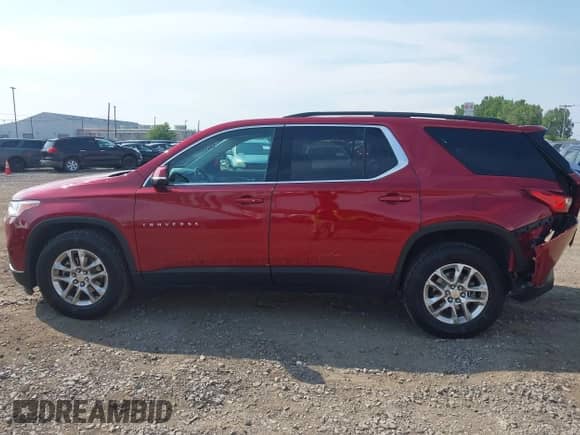 2019 Chevrolet Traverse LT z VIN 1GNEVHKW8KJ141247, wystawiony jako IAAI lot #42872355 z przebiegiem 104 324 mil mil oraz . Historia ofert i sprzedaży dostępna na DreamBid. Obrazek 14.